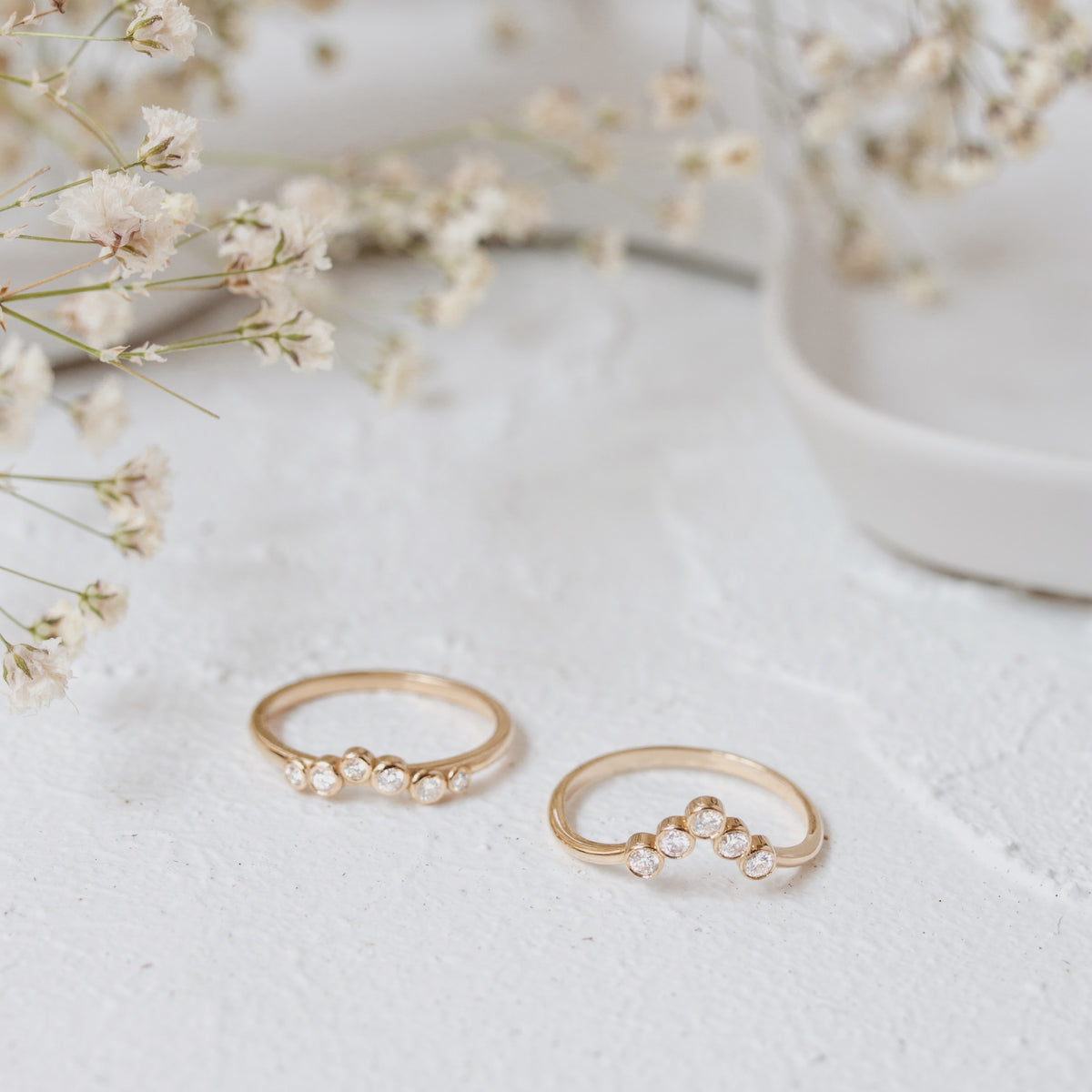 Bezel Set Curved Diamond Wedding Band in 14k Gold Orizzo fine jewelry