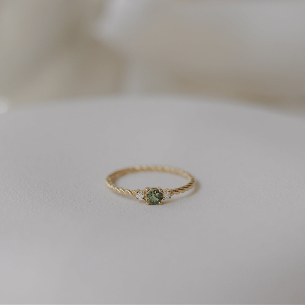 Twisted Band Green Sapphire Engagement Ring With Diamond Orizzo fine jewelry