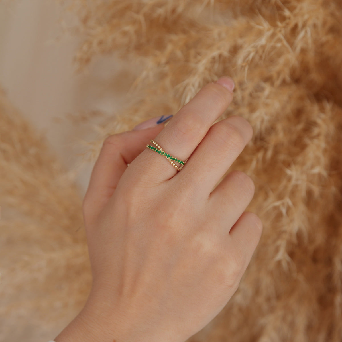 Criss Cross Emerald Gold Ring Orizzo fine jewelry