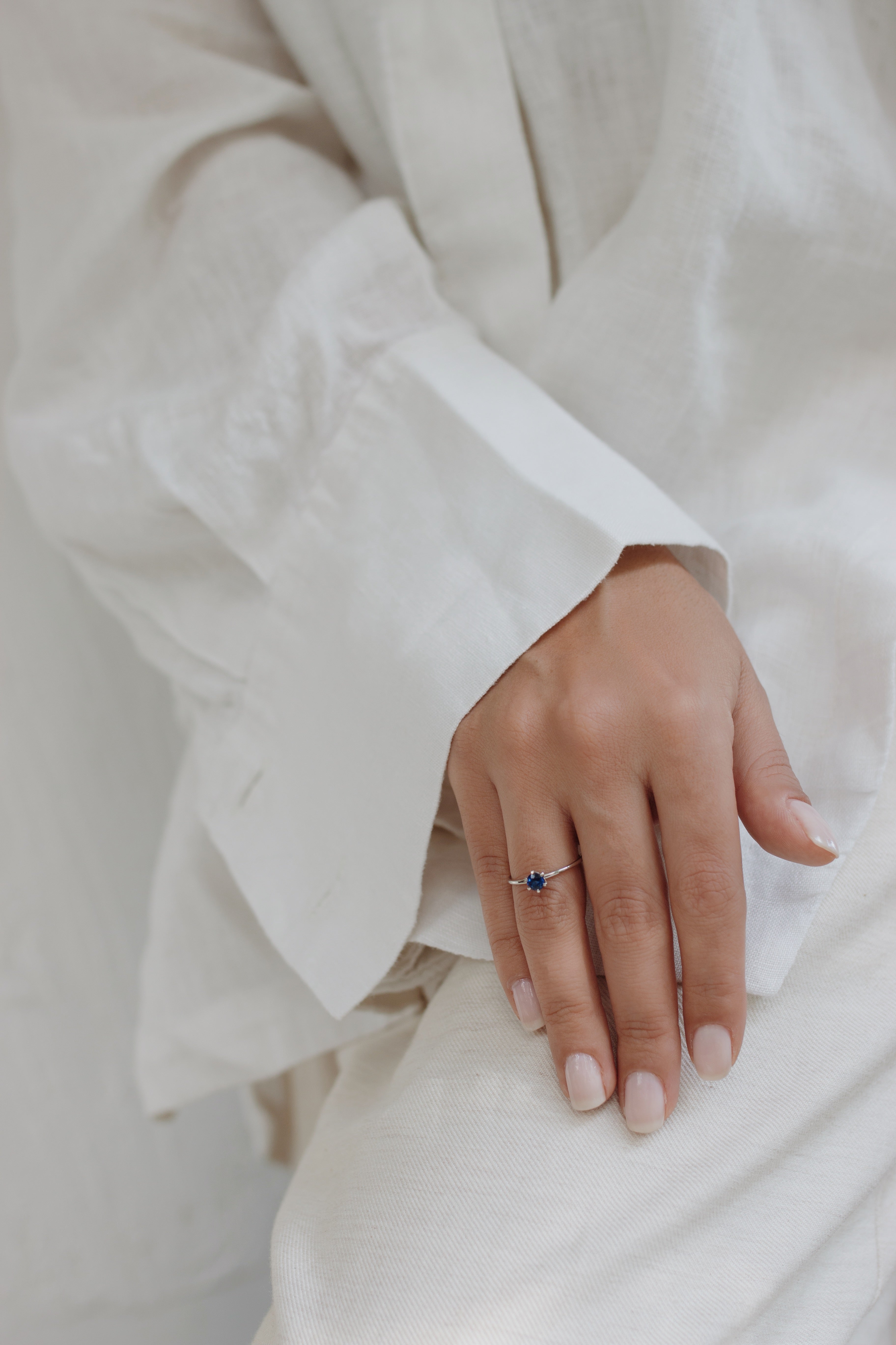 Solitaire Blue Sapphire Ring in Six Prong Setting Orizzo fine jewelry