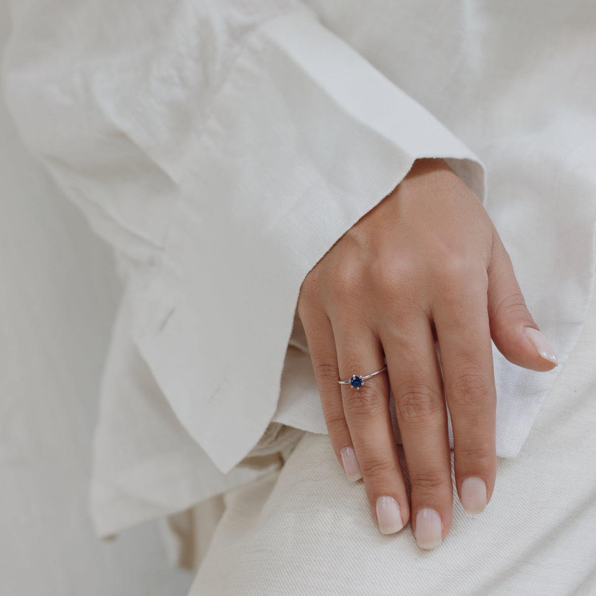 Solitaire Blue Sapphire Ring in Six Prong Setting Orizzo fine jewelry