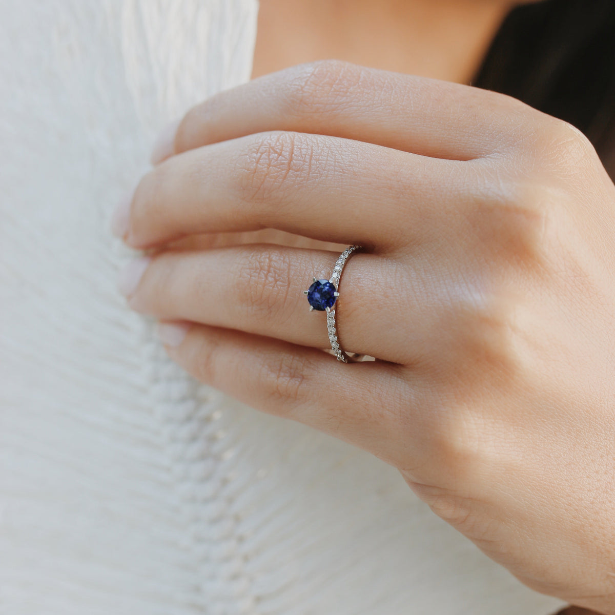 Halo Diamond Engagement Ring With Blue Sapphire Orizzo fine jewelry