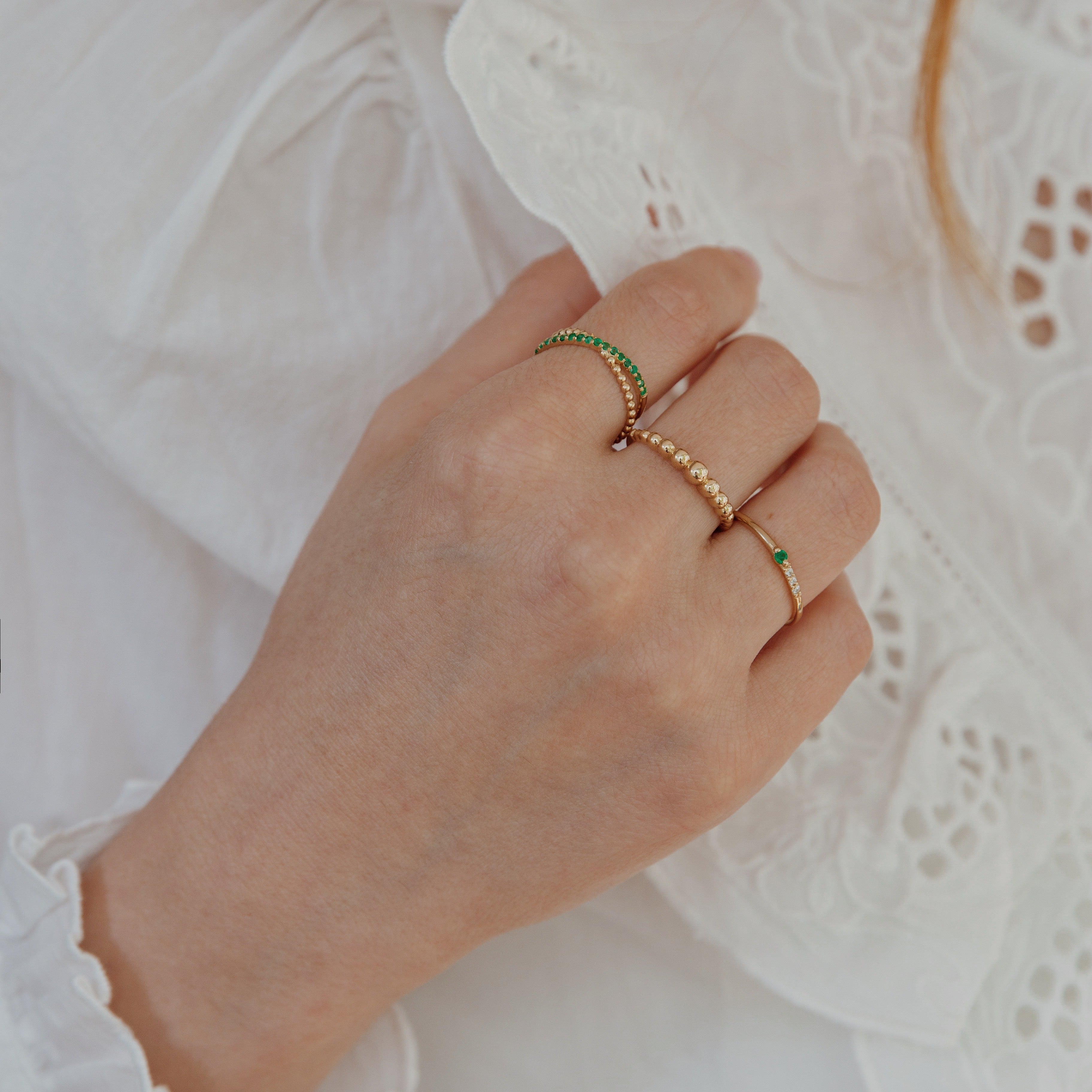 Criss Cross Emerald Gold Ring Orizzo fine jewelry