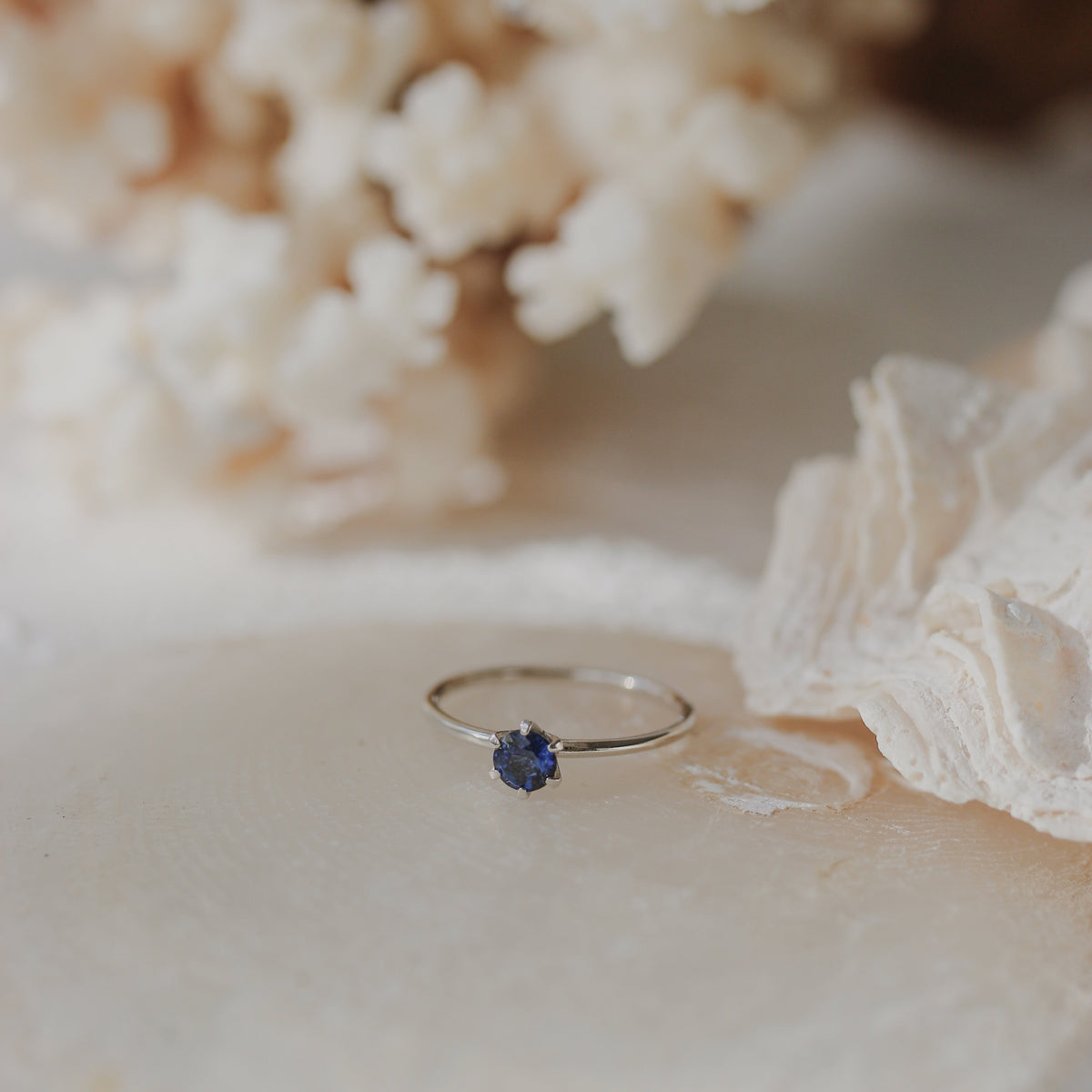 Solitaire Blue Sapphire Ring in Six Prong Setting Orizzo fine jewelry