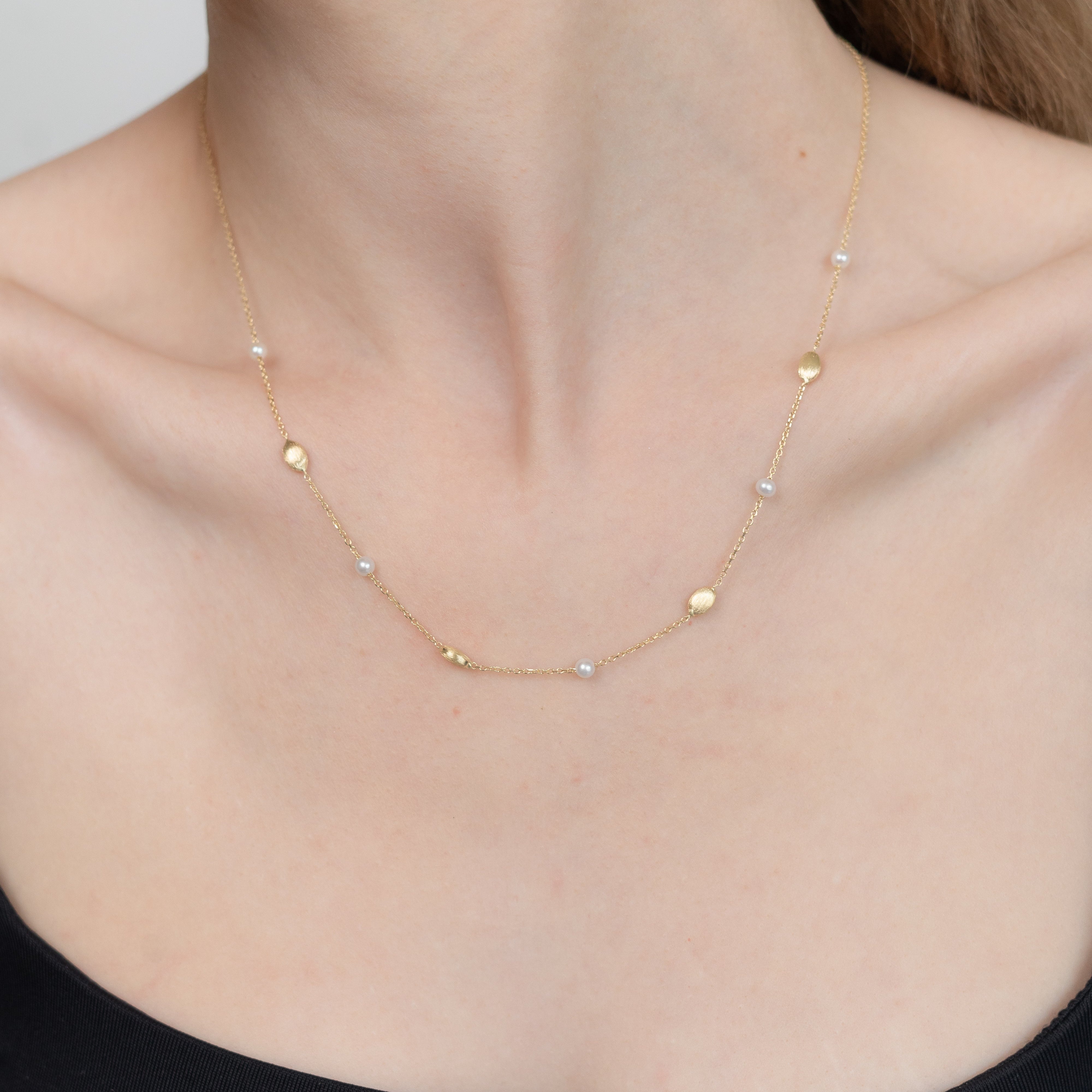 Gold Necklace with Pearls and Textured Beads