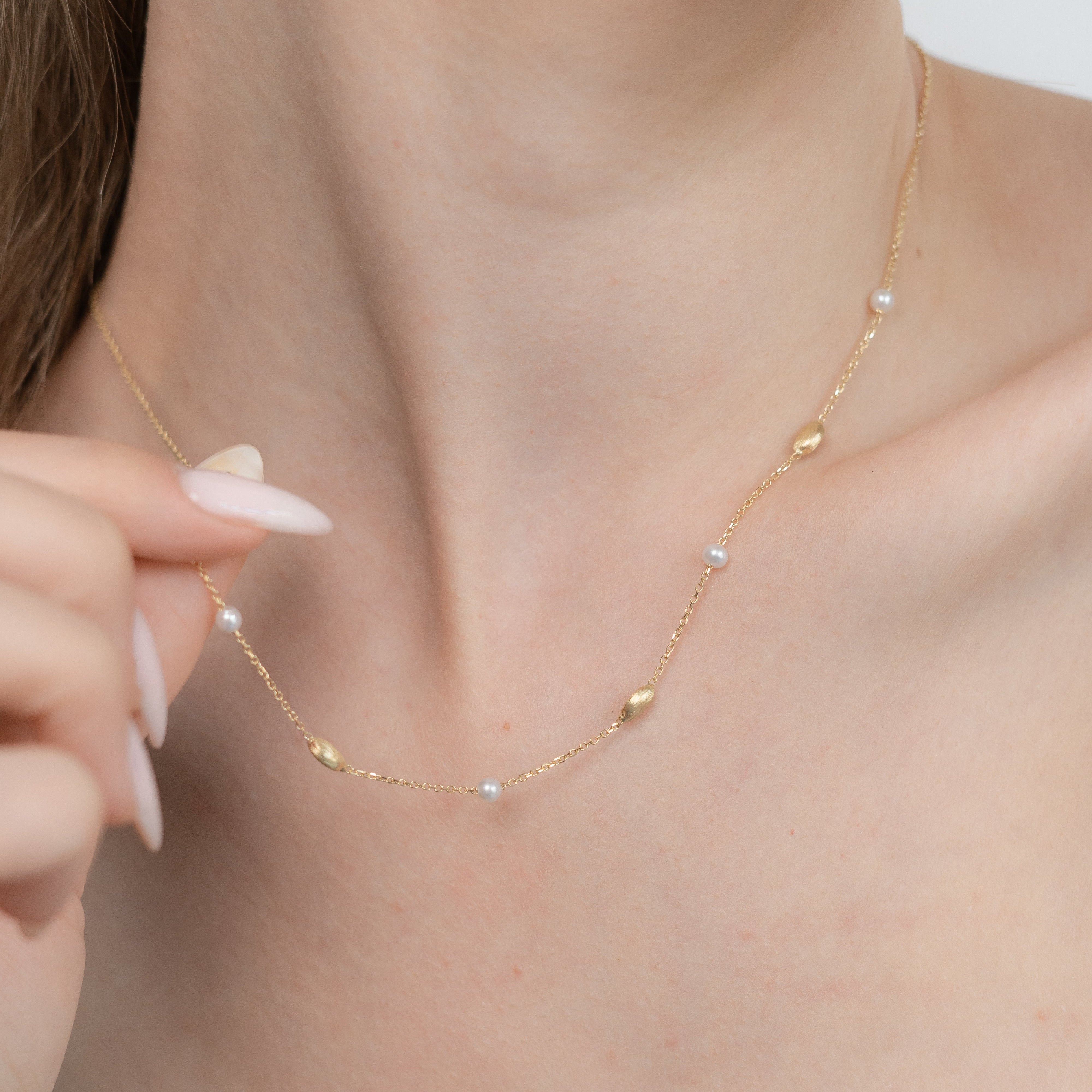 Gold Necklace with Pearls and Textured Beads