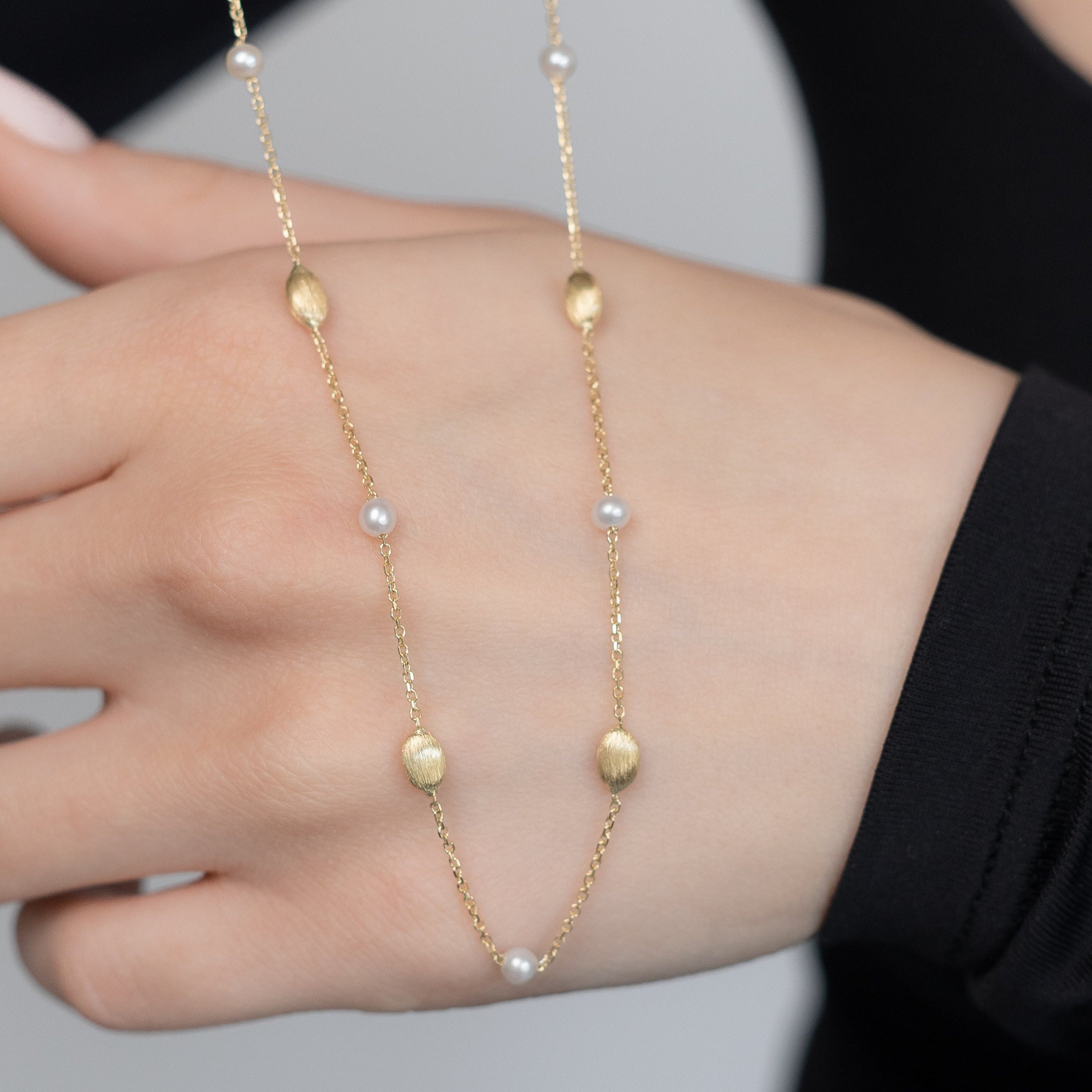 Gold Necklace with Pearls and Textured Beads