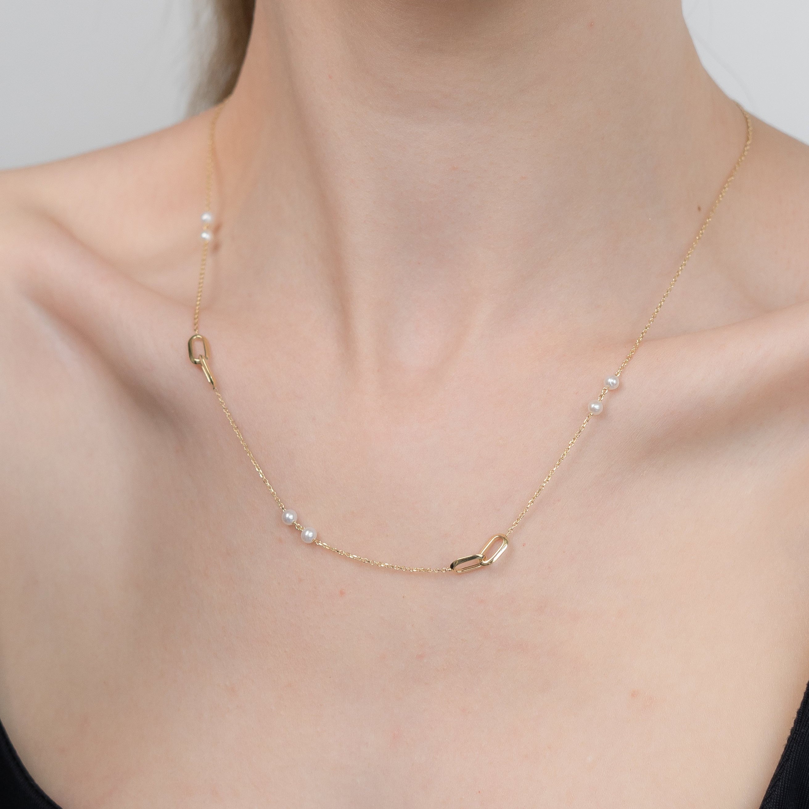 Gold Necklace with Pearls and Geometric Links