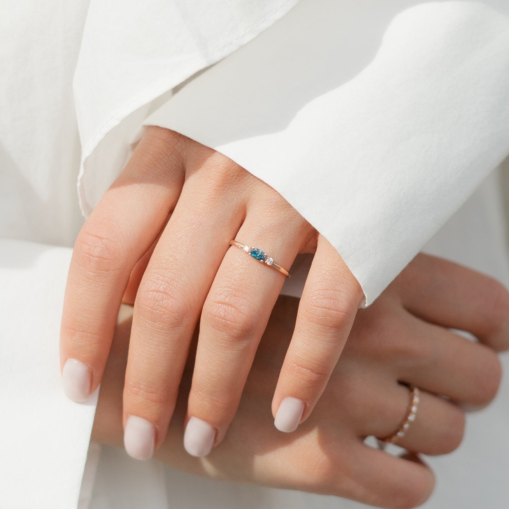 Horizontal Blue Diamond Ring With White Diamond