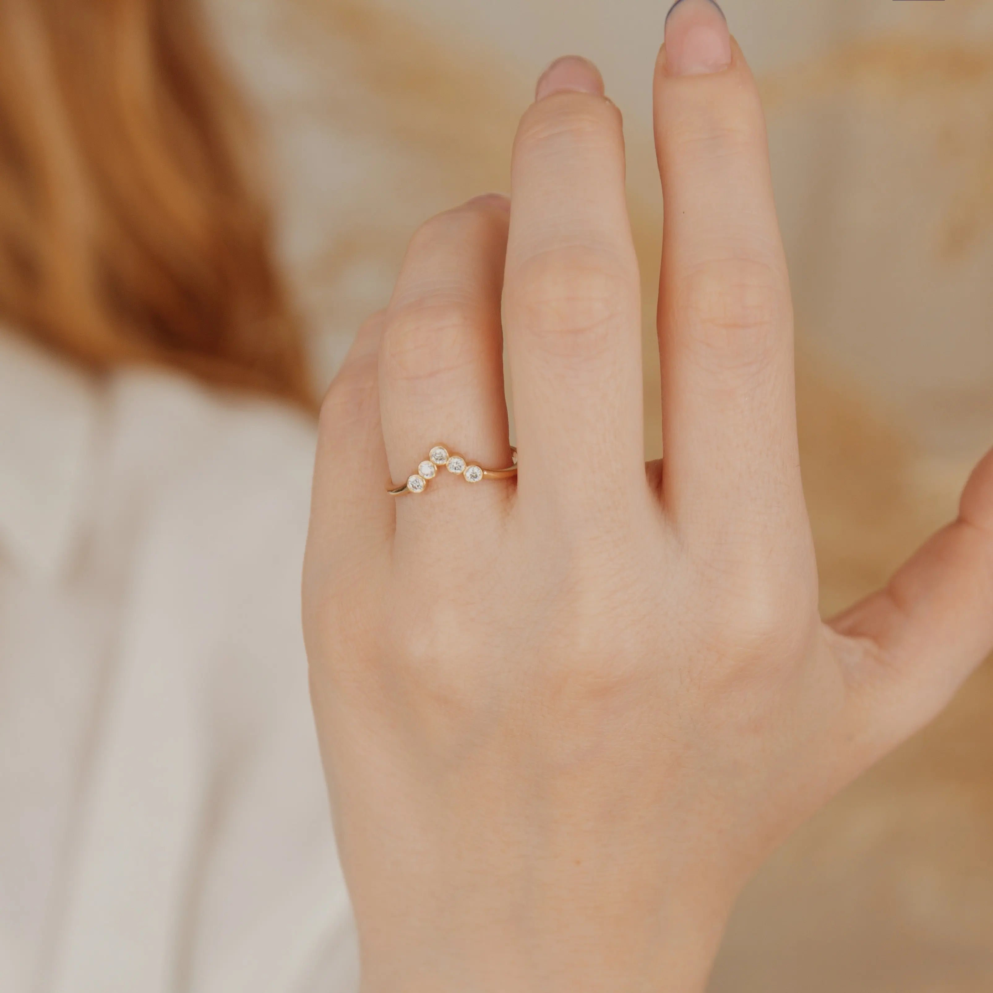 Bezel Set Curved Diamond Wedding Band in 14k Gold Orizzo fine jewelry