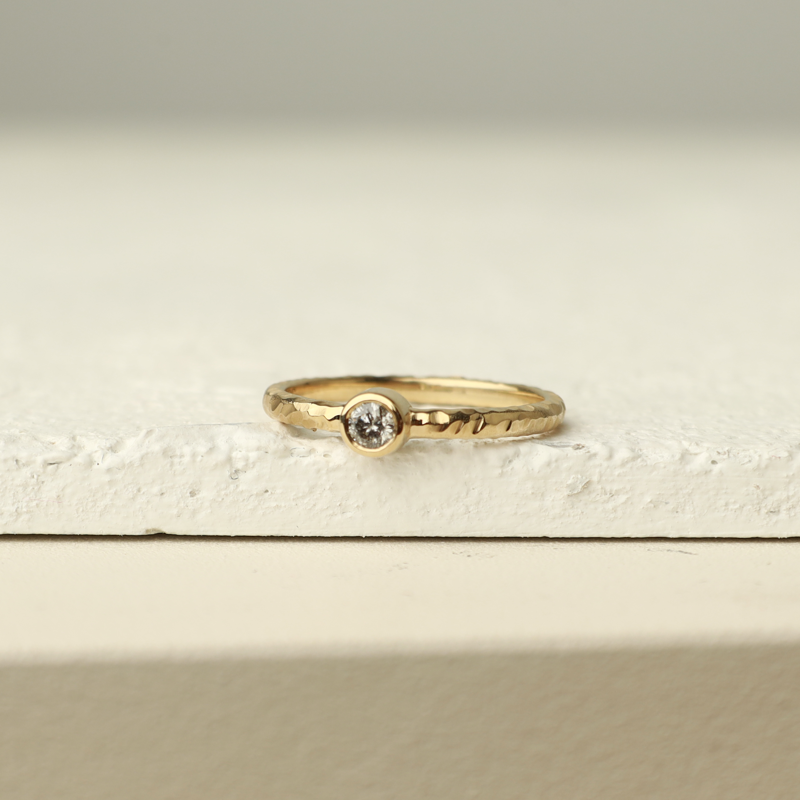 Bezel Set Diamond Ring In Hammered Band Orizzo fine jewelry