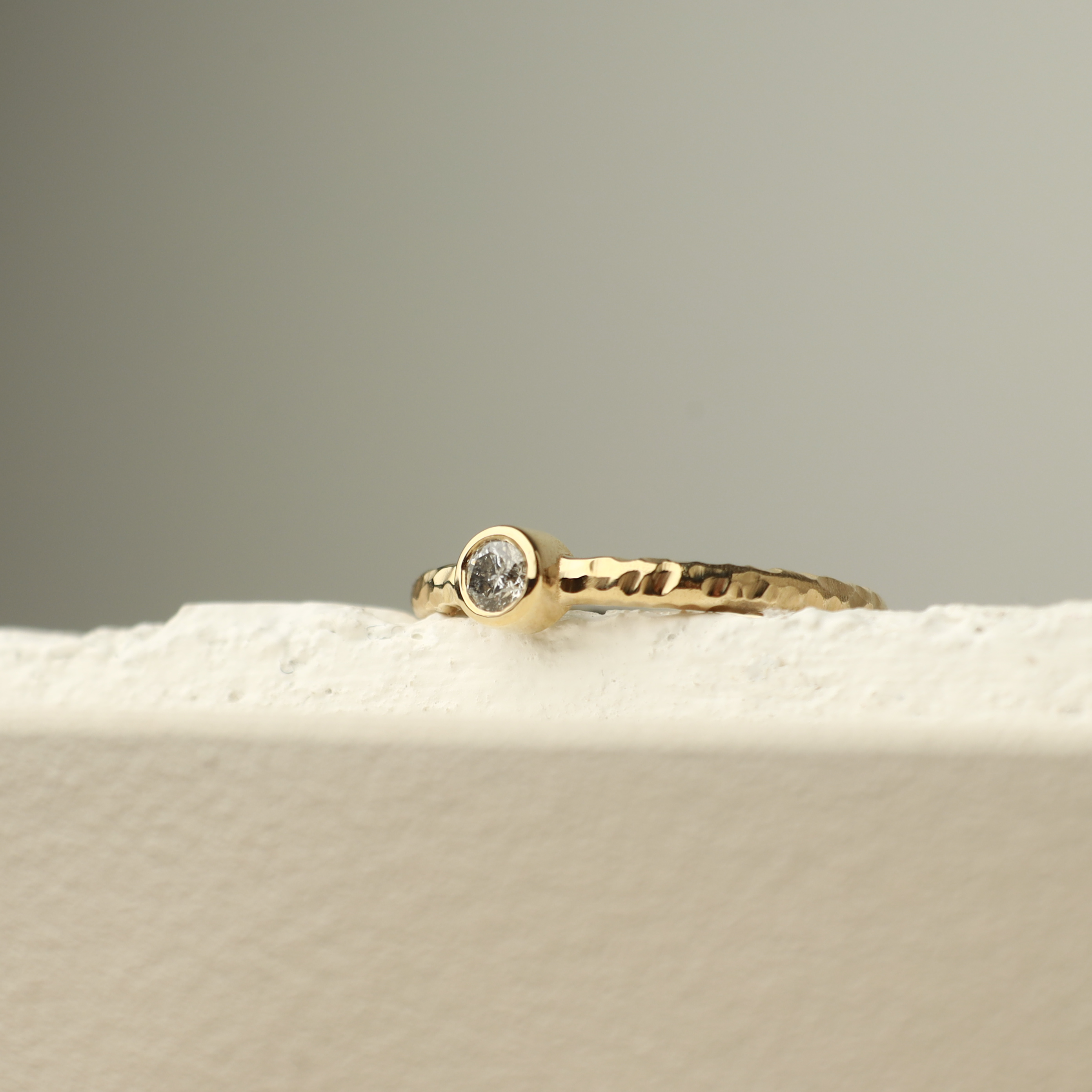 Bezel Set Diamond Ring In Hammered Band Orizzo fine jewelry