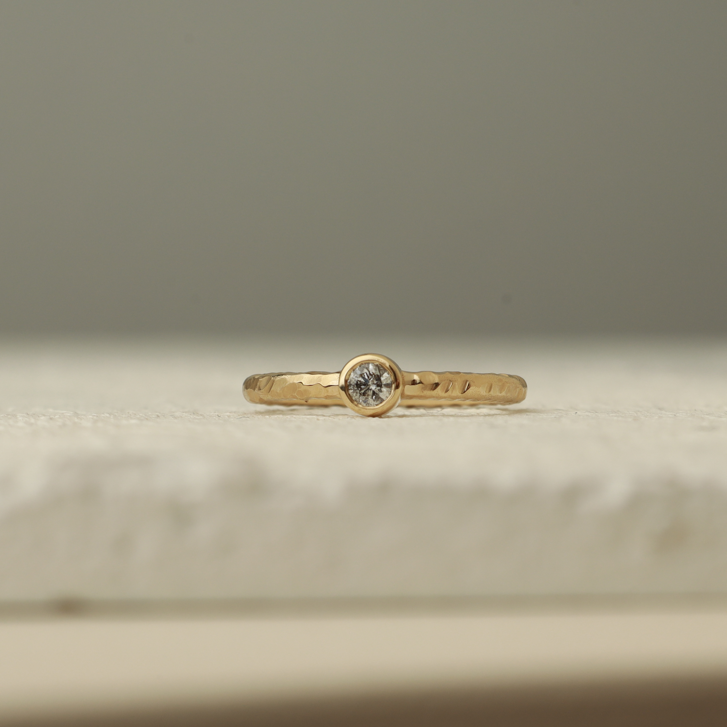 Bezel Set Diamond Ring In Hammered Band Orizzo fine jewelry