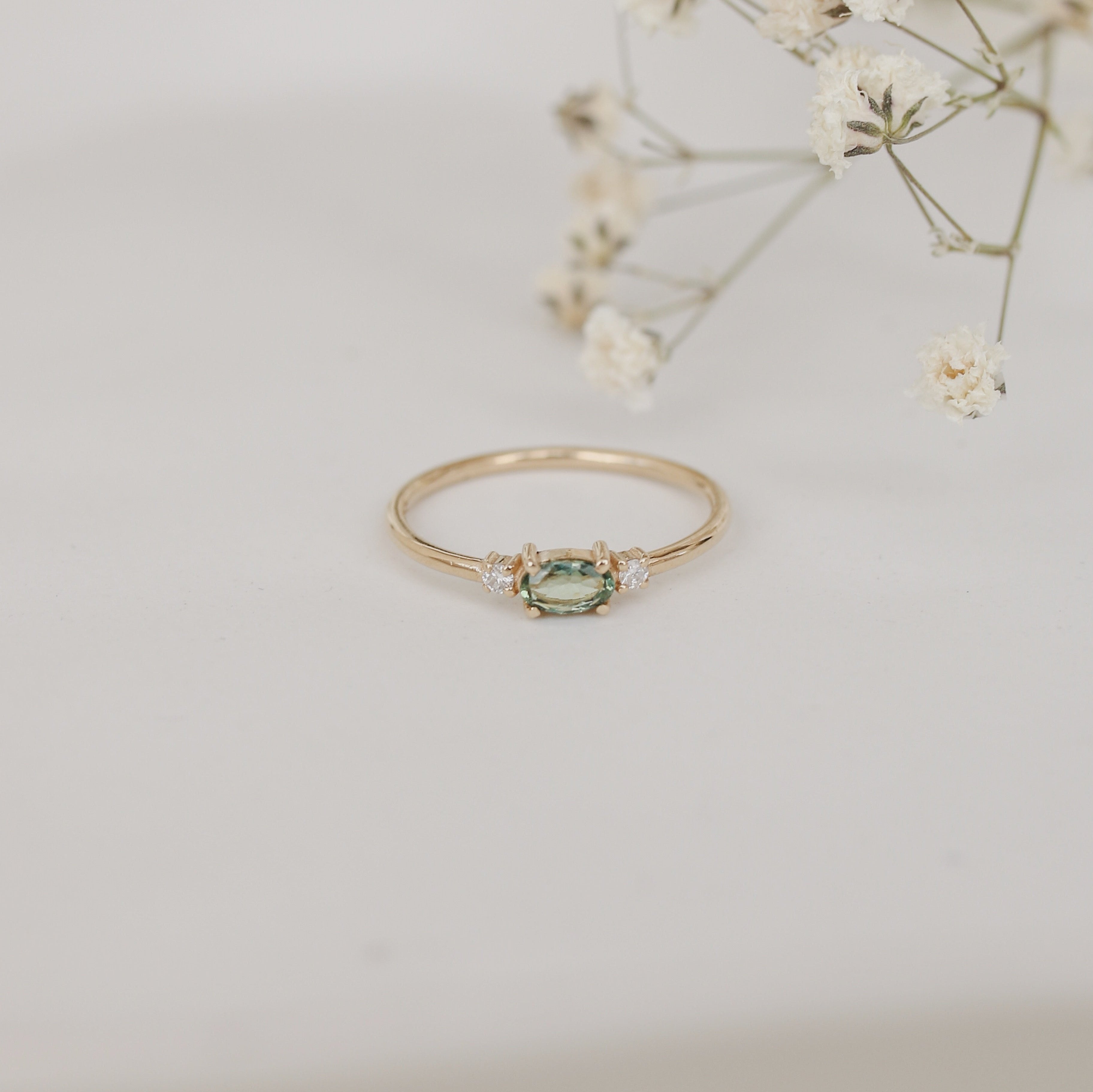 Three Stone Oval Green Sapphire Ring With Diamond