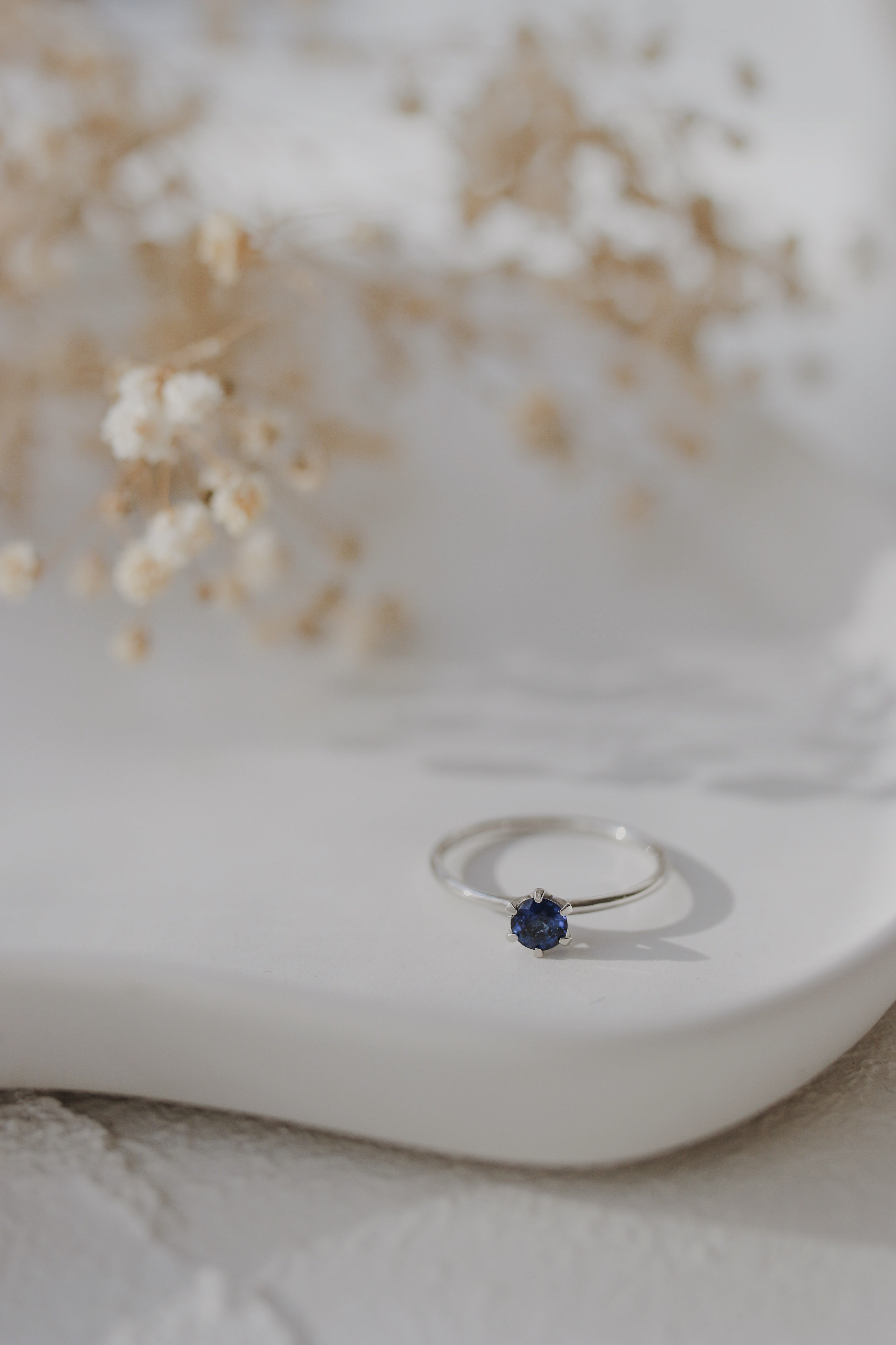 Solitaire Blue Sapphire Ring in Six Prong Setting Orizzo fine jewelry