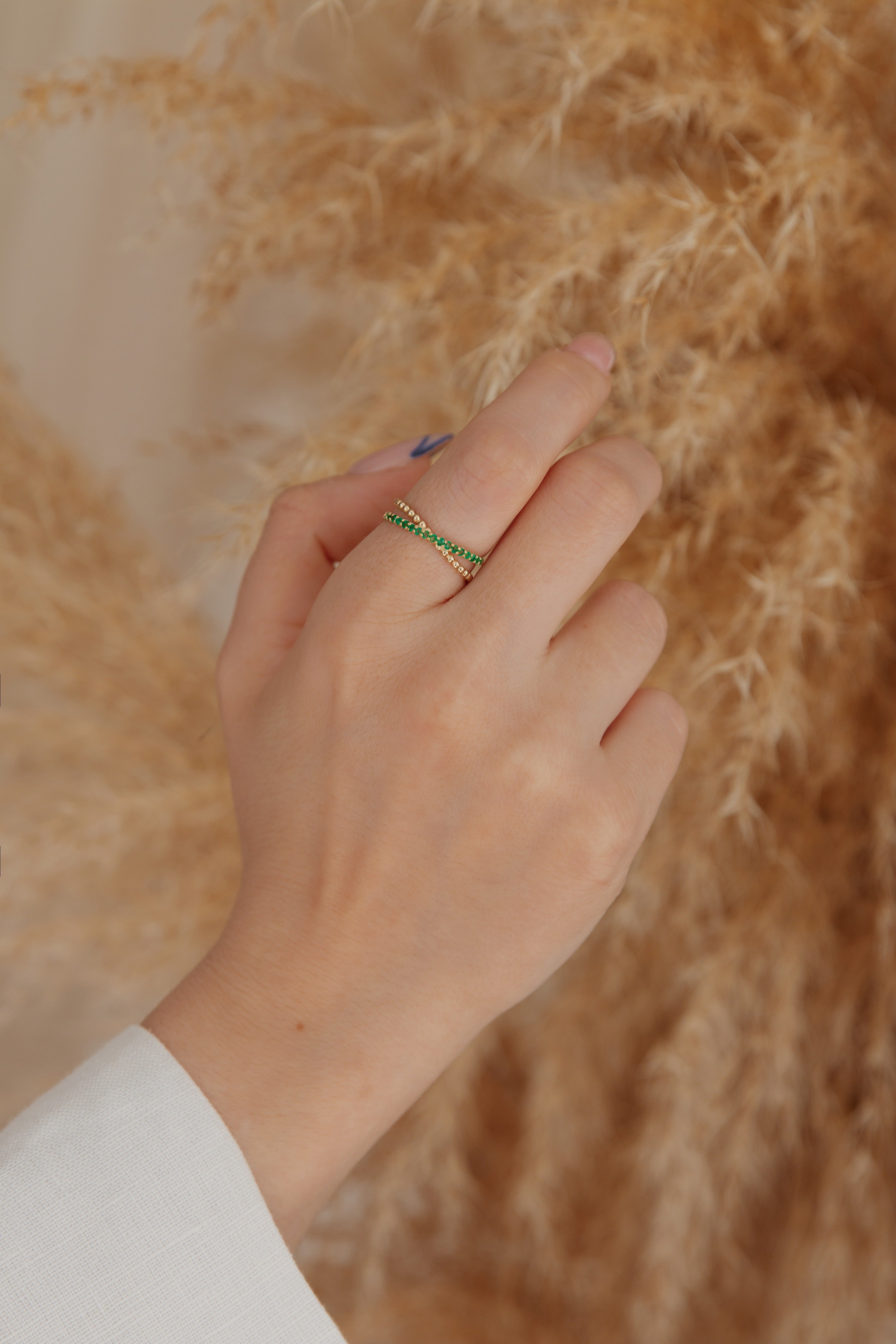 Criss Cross Emerald Gold Ring Orizzo fine jewelry