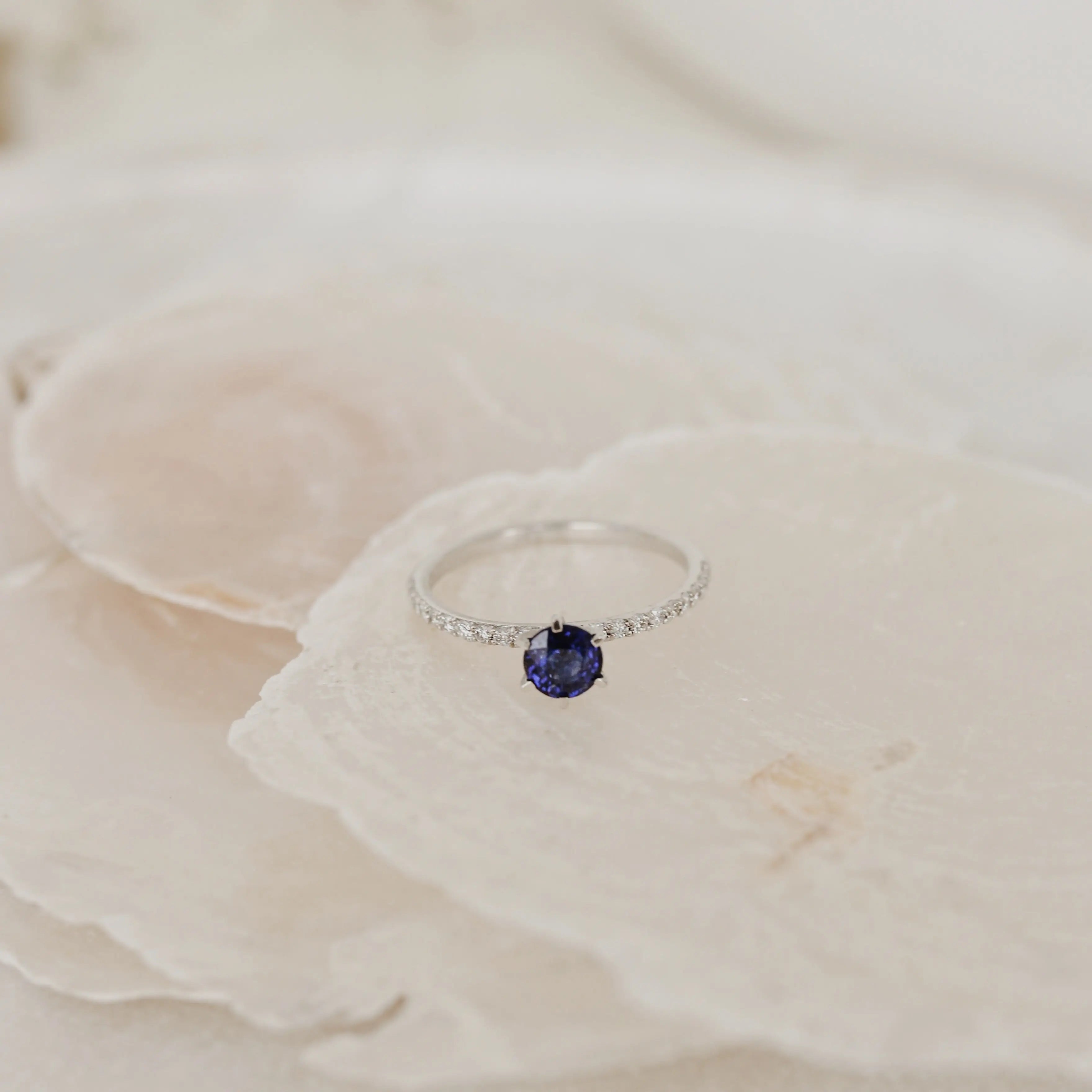 Halo Diamond Engagement Ring With Blue Sapphire Orizzo fine jewelry