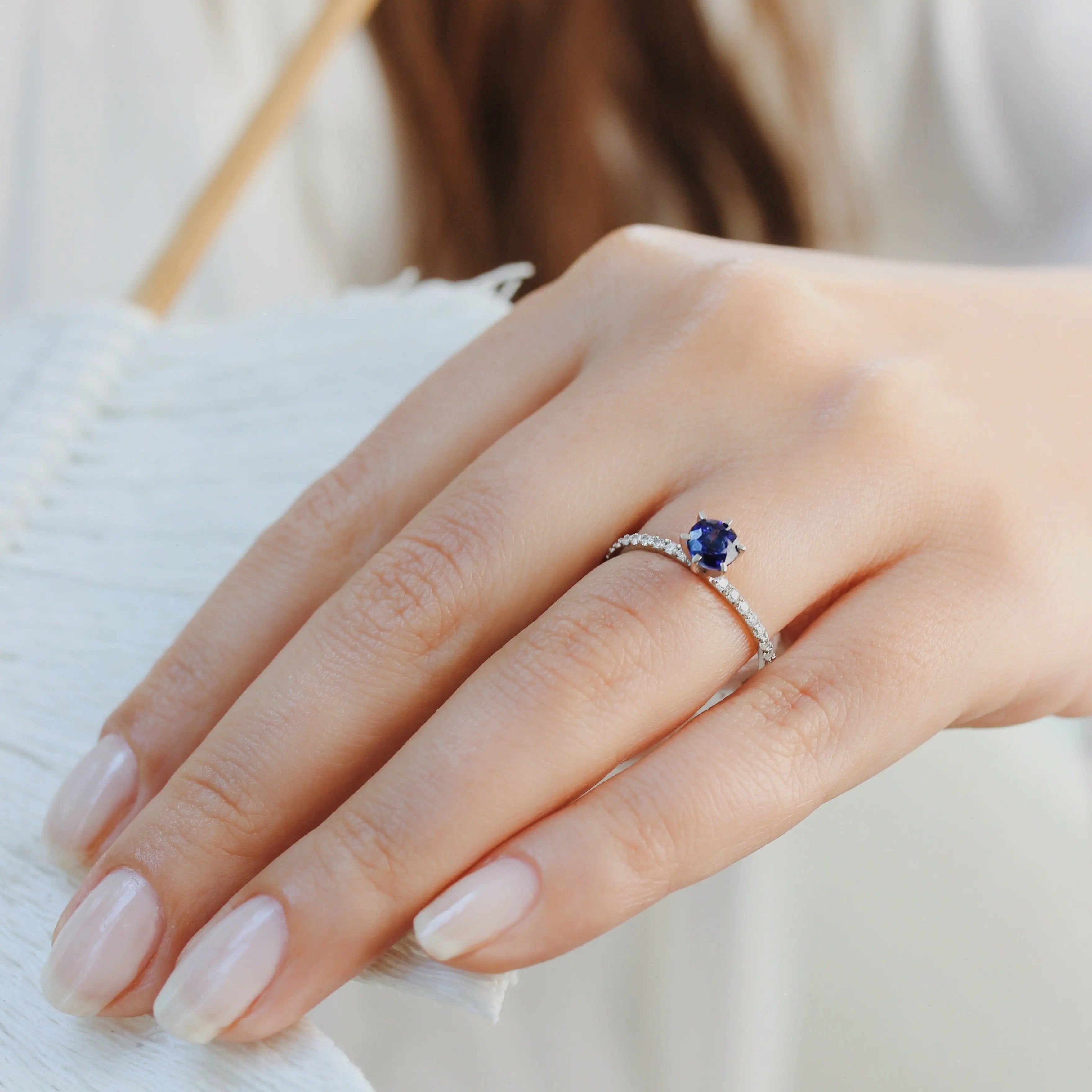 Halo Diamond Engagement Ring With Blue Sapphire Orizzo fine jewelry