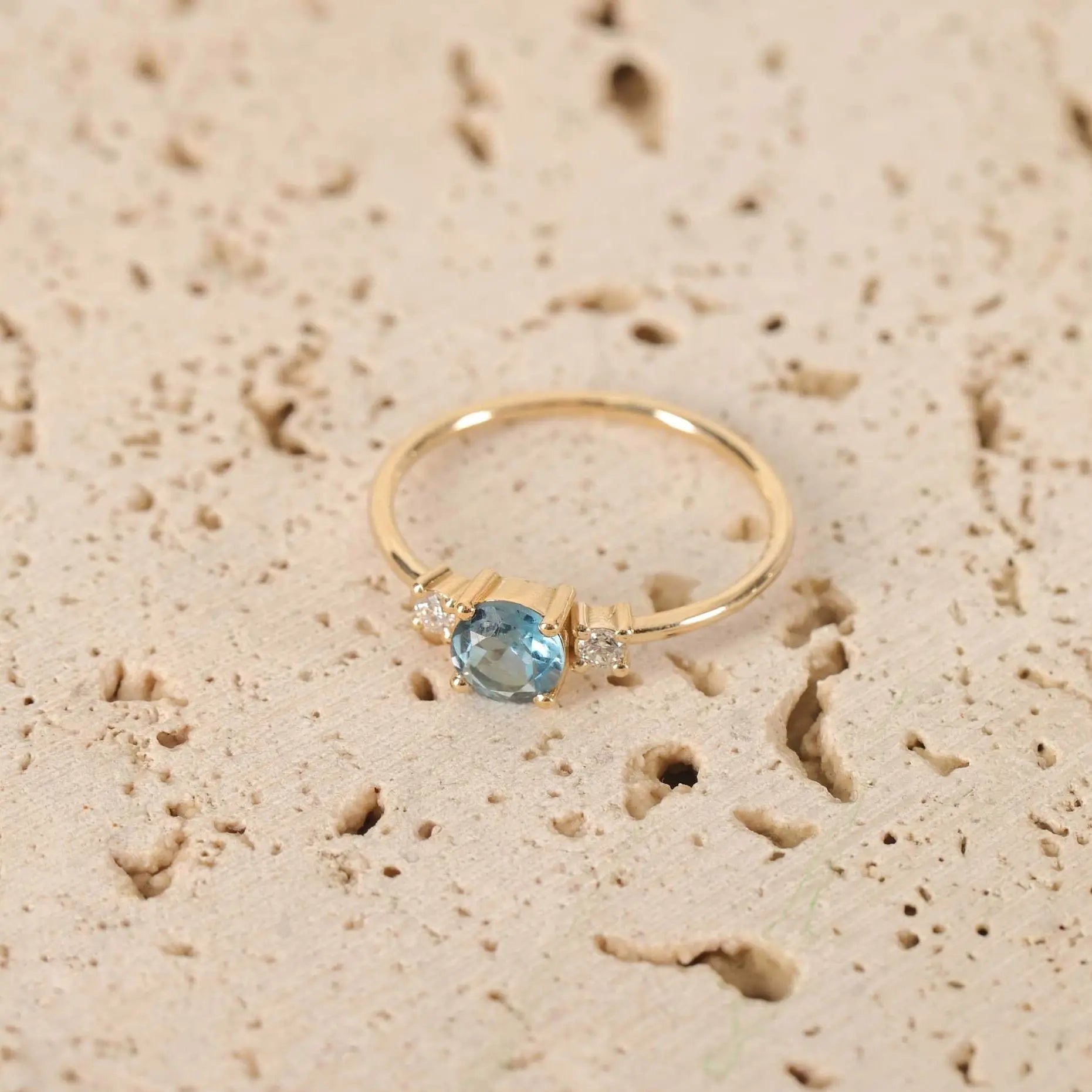 London Blue Topaz Three-Stone Engagement Ring With Diamond in 14K Solid Gold Orizzo fine jewelry