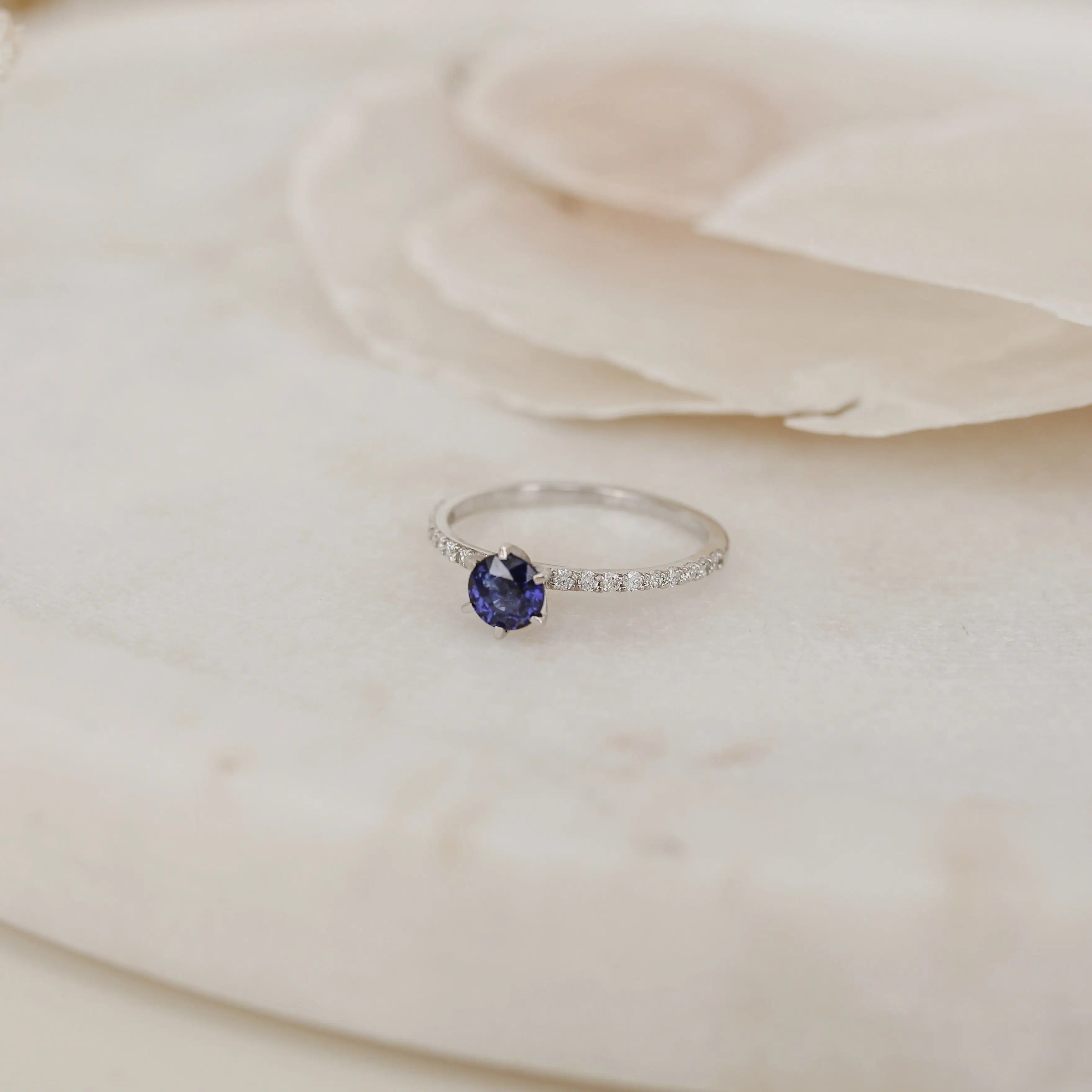 Halo Diamond Engagement Ring With Blue Sapphire Orizzo fine jewelry