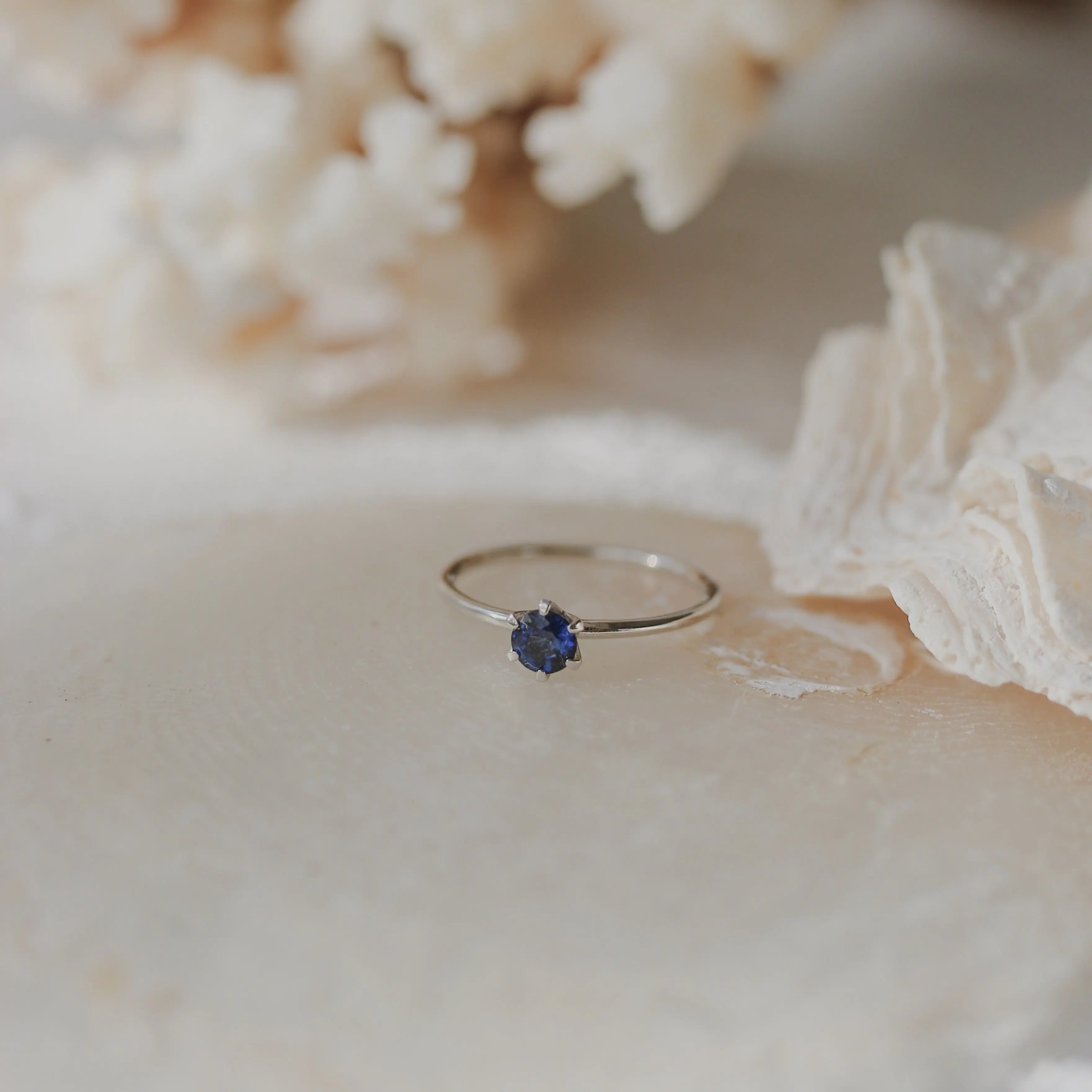 Solitaire Blue Sapphire Ring in Six Prong Setting Orizzo fine jewelry