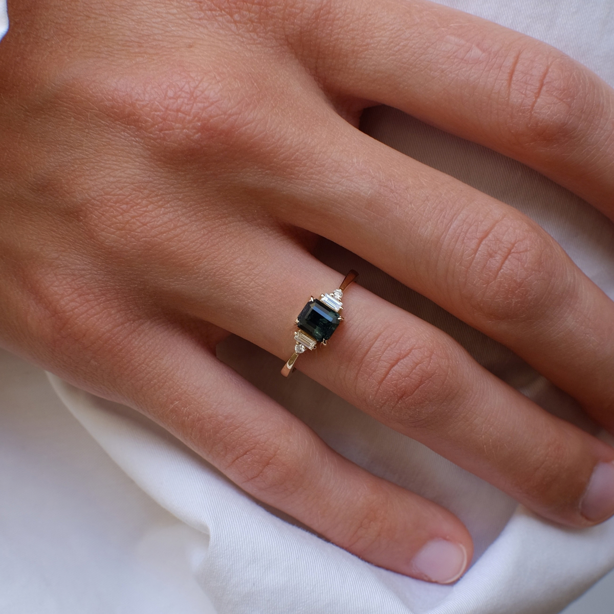 Emerald Cut Teal Sapphire Ring with Baguette & Round Diamonds