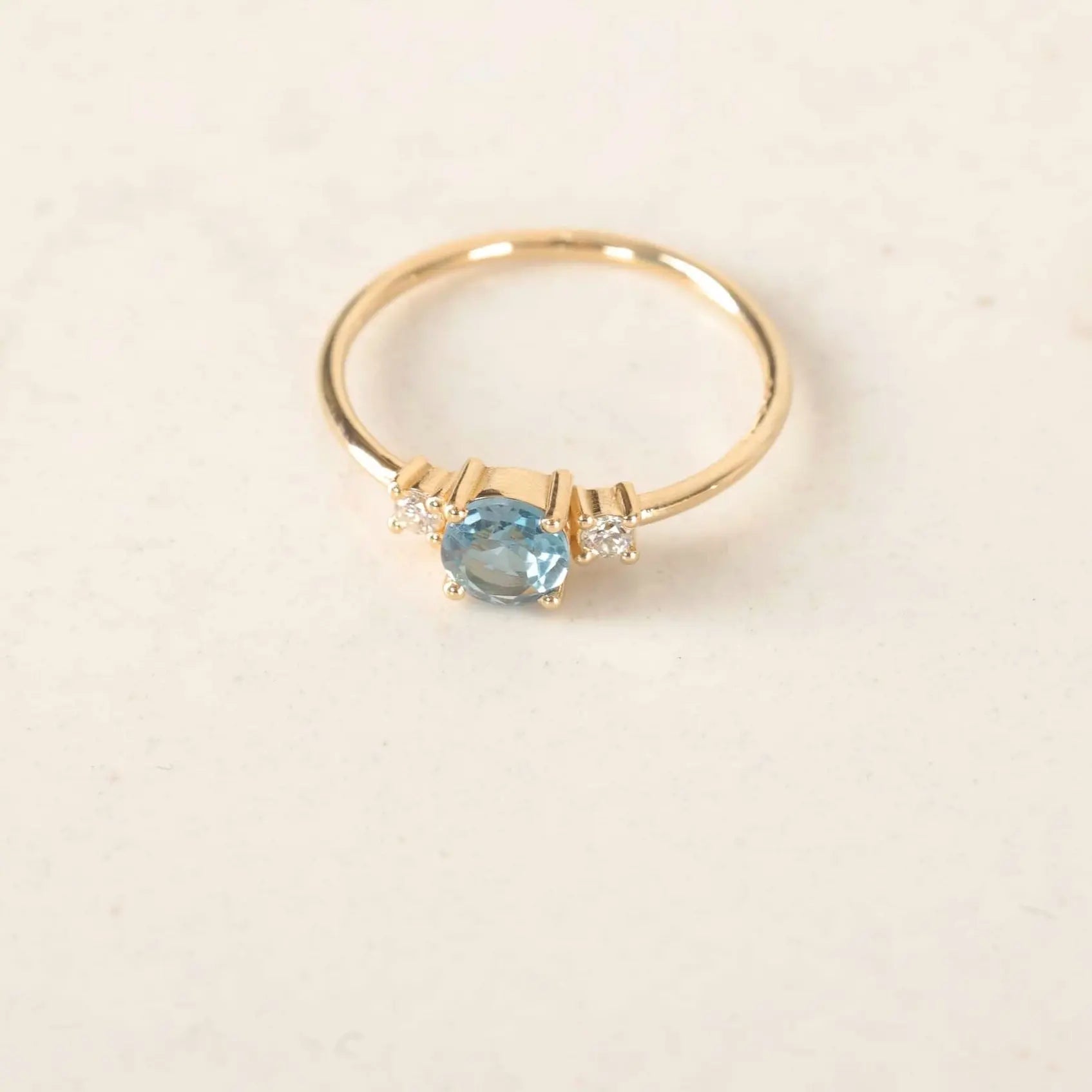 London Blue Topaz Three-Stone Engagement Ring With Diamond in 14K Solid Gold Orizzo fine jewelry