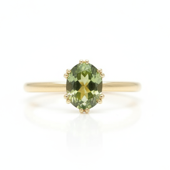 Faceted Oval Moldavite In 14K Gold