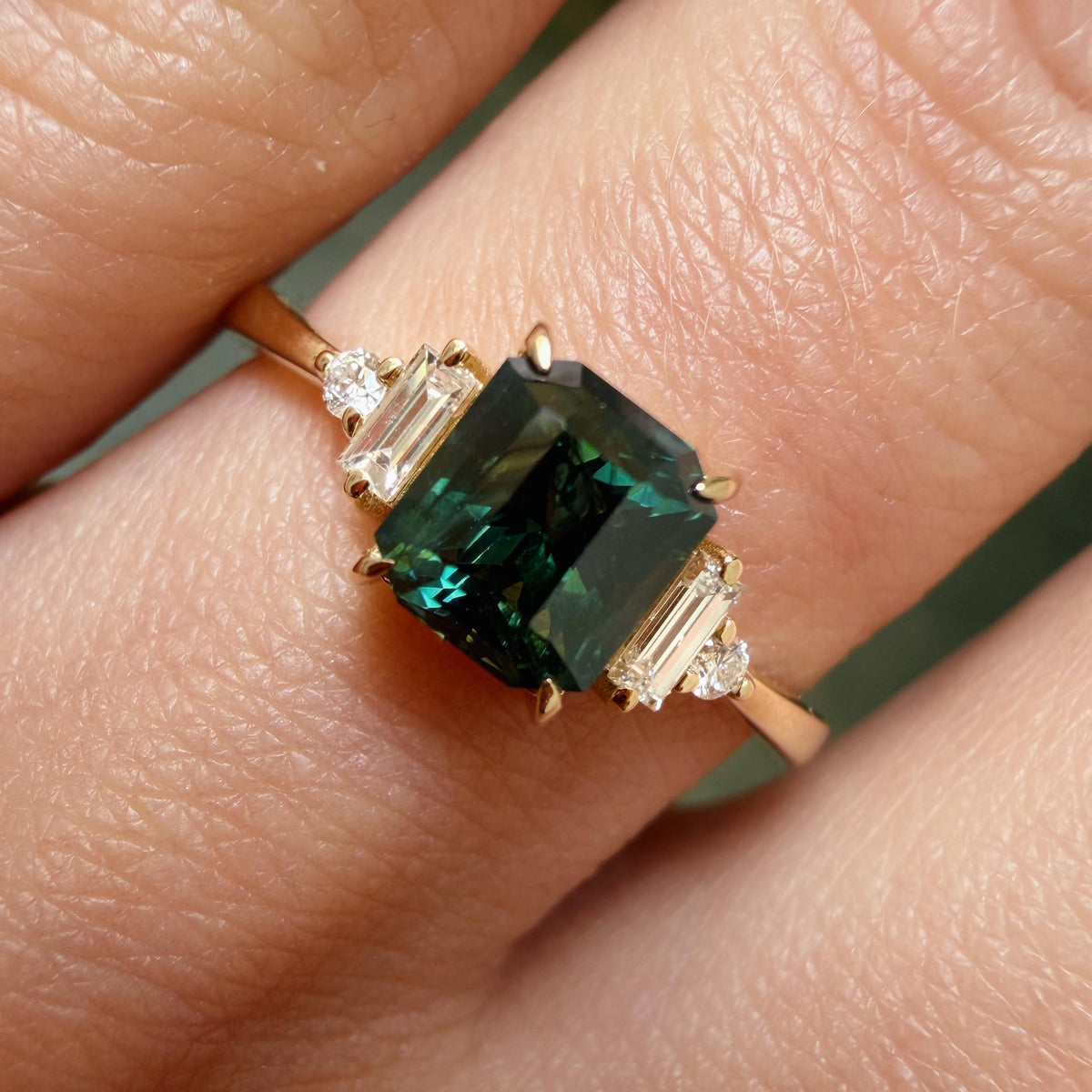 Emerald Cut Teal Sapphire Ring with Baguette & Round Diamonds