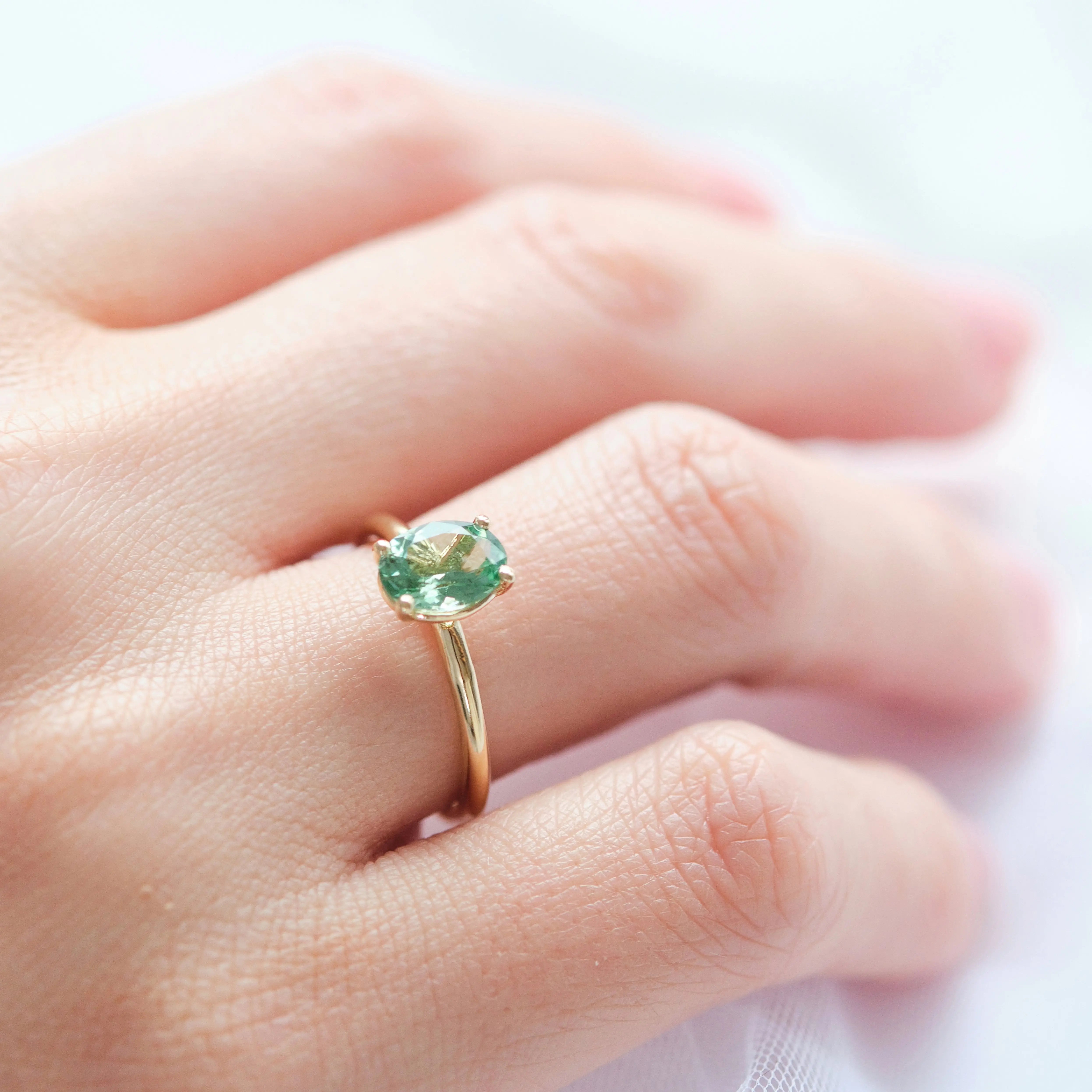 Solitaire Oval Green Tourmaline Ring Orizzo fine jewelry