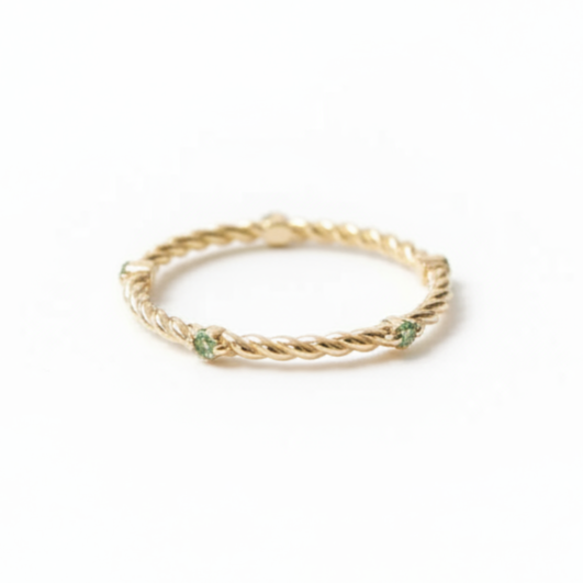 Propletená svatební obroučka se zelenými safíry ze 14karátového zlata