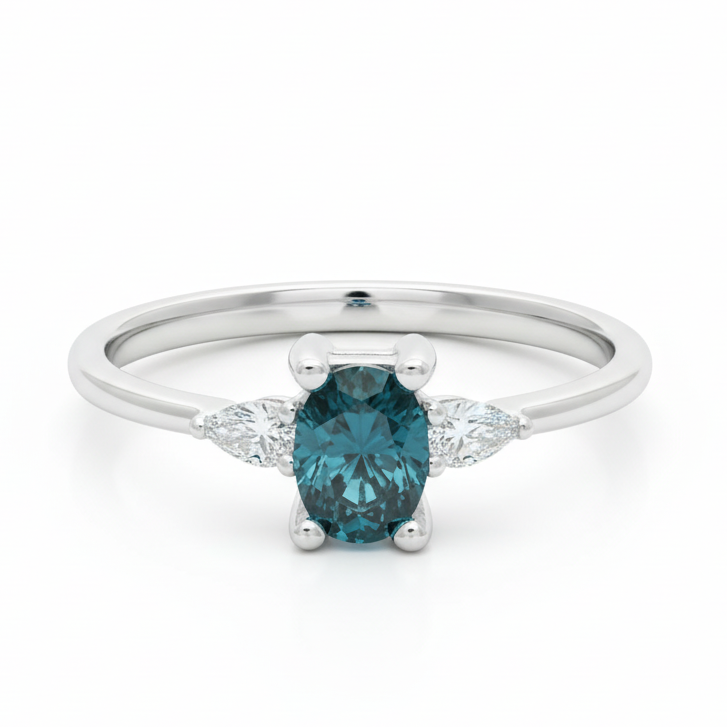 Tříkamenový prsten s modrým diamantem a hruškovými diamanty ze 14karátového zlato