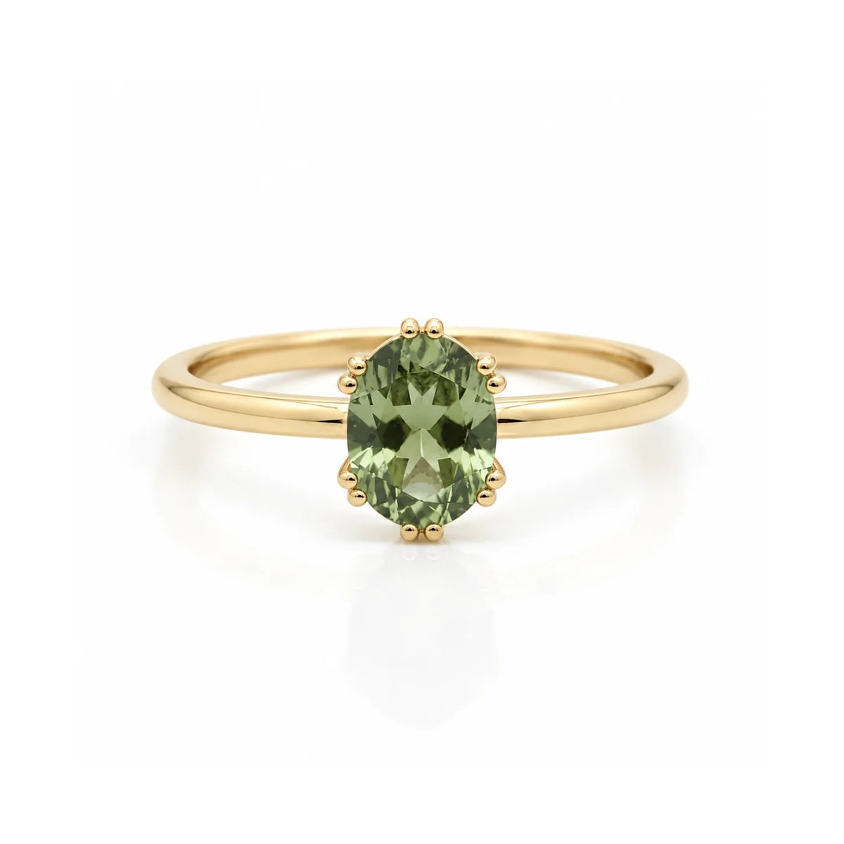 Faceted Oval Moldavite In 14K Gold